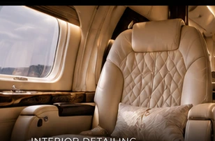 Luxury aircraft cabin with cream leather seating